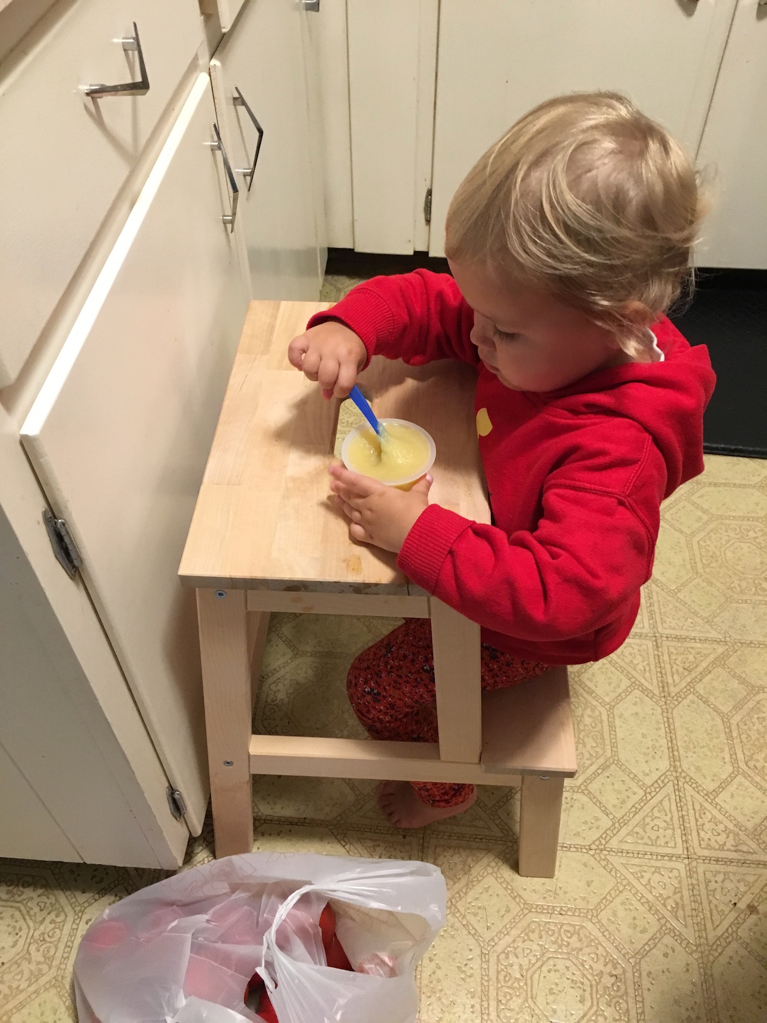 Sitting at her table